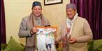 CM Dhami gifts Harish Rawat self-grown rice