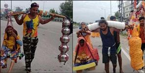 image: Ajay and Dev came to Haridwar with their mother sitting on the kanwar