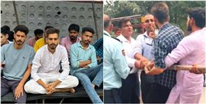 image: Students of Garhwal University sit on strike